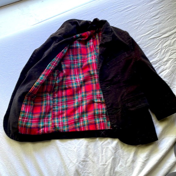 A black blazer for toddlers, has a flannel style in the inside. - Picture 2 of 2